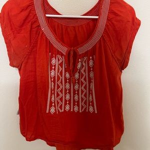 Orange embroidered shirt